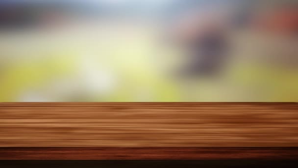 Порожній дерев'яний стіл дошки перед розмитим жовтувато-зеленим і чорно-сірим тлом. Ефект світла та витоку. HD кадри
 - Кадри, відео