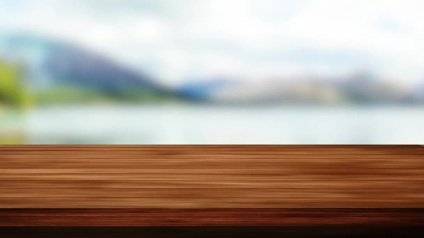 Houten tafel bar en wazig rivier, berg, wolken achtergrond. Licht en lek effect. HD-beelden - Video