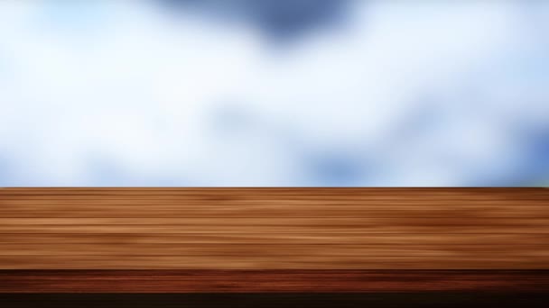 Houten tafel bar en wazig wolken achtergrond. Licht en lek effect. HD-beelden - Video