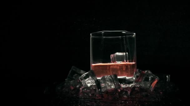 glass of whiskey with ice - Footage, Video