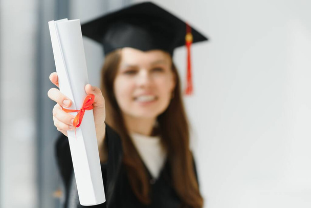 Graduation: Student Standing With Diploma - Фото, изображение