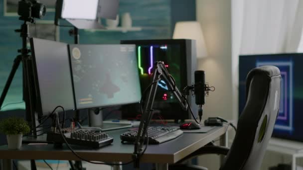 Empty streaming studio with RGB led lights powerful personal computer - Footage, Video