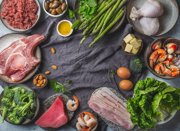 Food background with meat, eggs, fish, seafood, and vegetables. Top view, copy space - Foto, Bild