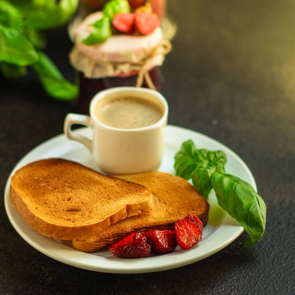 toasts with strawberry jam and coffee - Photo, Image