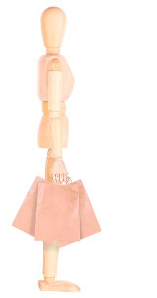 Happy wooden Dummy with shopping bags - Photo, Image