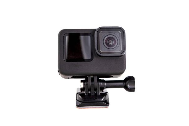 New 4K action camera on a suction mount in black color. Isolated on white background - Photo, Image