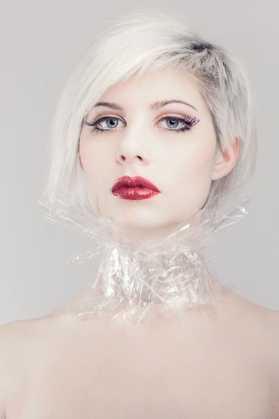 Pretty blonde fashion woman in plastic - Photo, Image