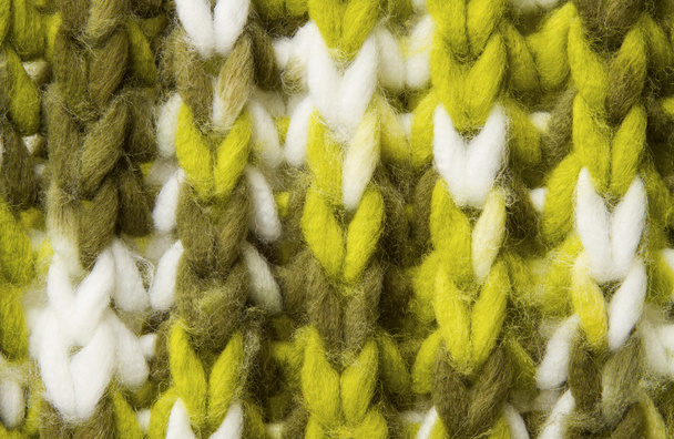 Woolen texture background, knitted wool fabric close up, green hairy fluffy textile - 写真・画像
