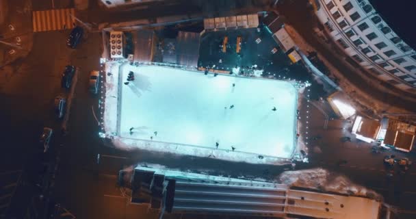 people on the skating rink for christmas. top view of the ice rink - Footage, Video