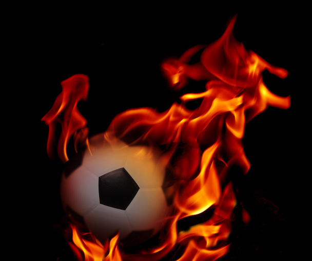 Labdarúgás labdarúgó és a lángoló tűz - Fotó, kép