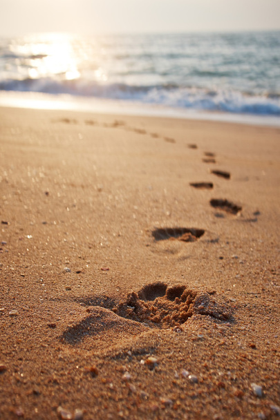 Footprints on the beach sand - Φωτογραφία, εικόνα