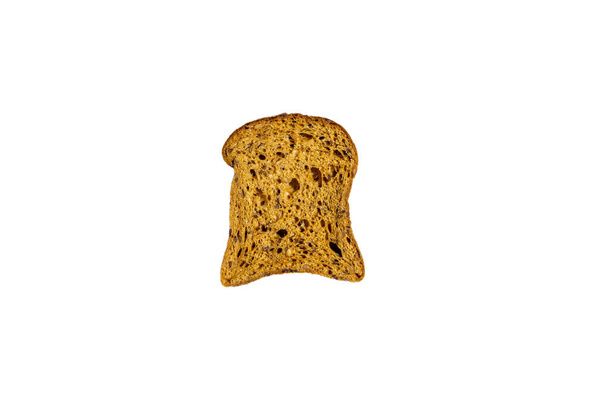 Kawałek świeżego brązowego chleba do toastu izolowany na białym tle, widok z góry. Zbliżenie. - Zdjęcie, obraz