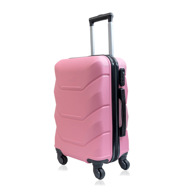 Розовый дорожный чемодан на колесах, изолированный на белом фоне. Модный детский чемодан. - Фото, изображение