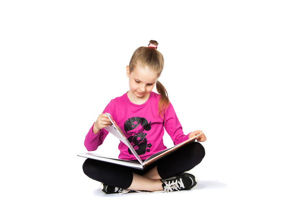 girl reading a book on white background - Foto, Imagen