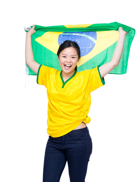 Asiáticas hinchas de fútbol sosteniendo bandera de Brasil
 - Foto, Imagen