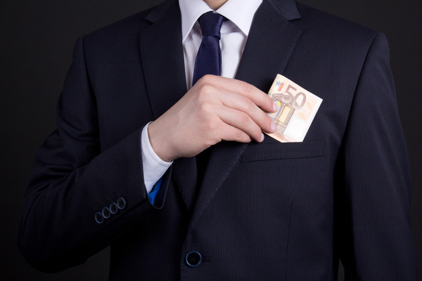 business man with euro banknotes in the pocket - Foto, Imagem