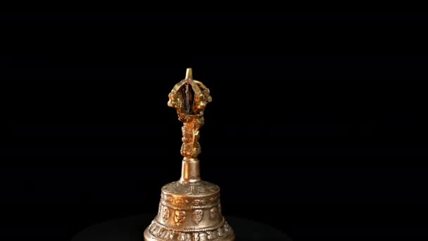 copper Tibetan ritual bell, represents the feminine principle of excellence in wisdom, religious items rotate - Footage, Video