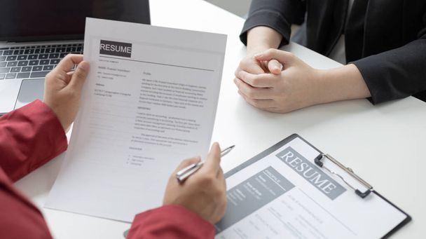 Employer or HR department is reading the resume and interviewing the ability of new employees, Employer is selecting job applicants, Employment and Recruitment Concept. - Photo, Image