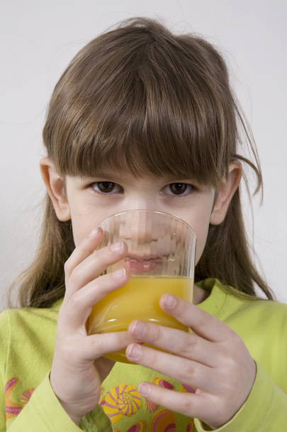 Girl drink orange juice - Fotó, kép