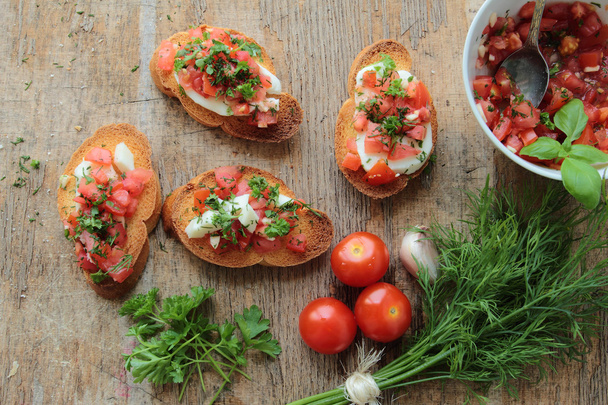 Fresh bruschettas for appetizer with vegetables - Photo, Image
