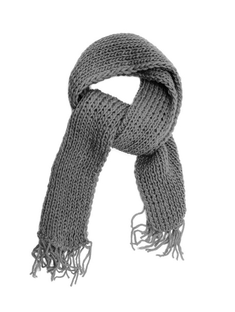 Knitted scarf on a white background. - Фото, изображение