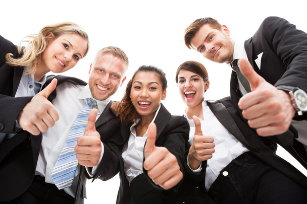 Portrait Of Business People Gesturing Thumbs Up - Photo, image