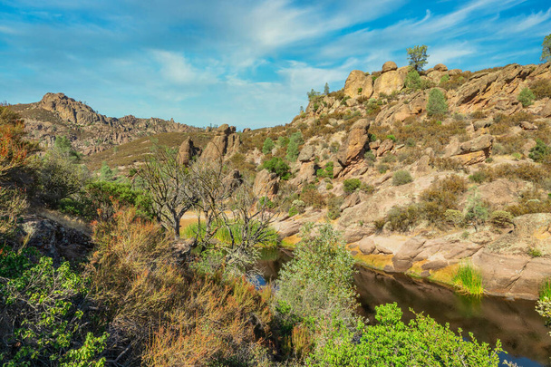 Rock formations in Pinnacles National Park, in California, the destroyed remains of an extinct volcano on the San Andreas Fault. Beautiful landscapes, cozy hiking trails for tourists and travelers. - Photo, Image