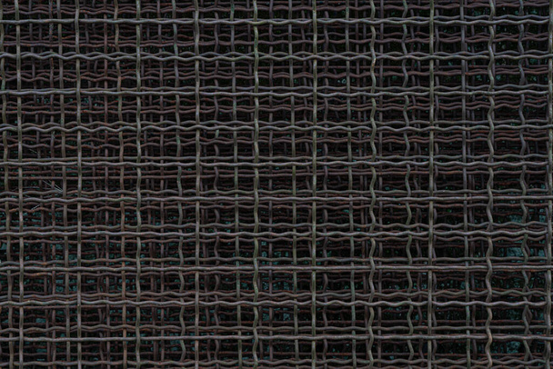 фон в виде металлической сетки-цепи - Фото, изображение