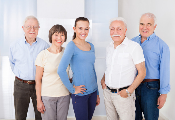 Confident Caregiver With Senior People - Photo, Image
