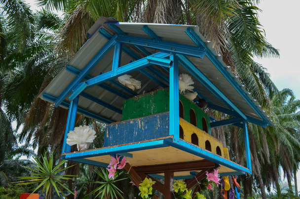 Selective focus of birdhouse hanging on tree - Photo, Image