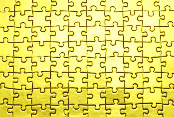 achtergrond van gouden puzzel - Foto, afbeelding