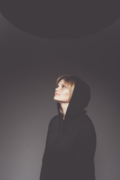 Beautiful woman in black hood - Fotó, kép
