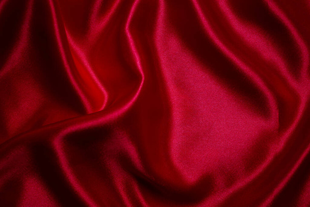 Punainen silkki tai satiini ylellisyyttä kangas rakenne voi käyttää abstrakti tausta - Valokuva, kuva