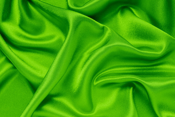 Green satin fabric as background - Photo, Image