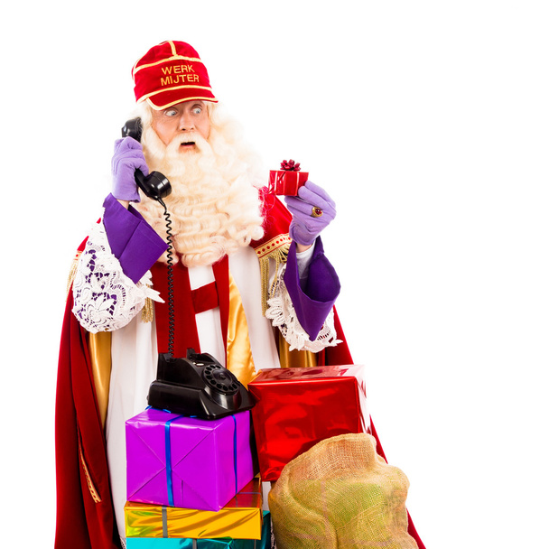 Sinterklaas con teléfono
 - Foto, Imagen