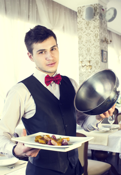 Waiter with a tray of food - Fotoğraf, Görsel
