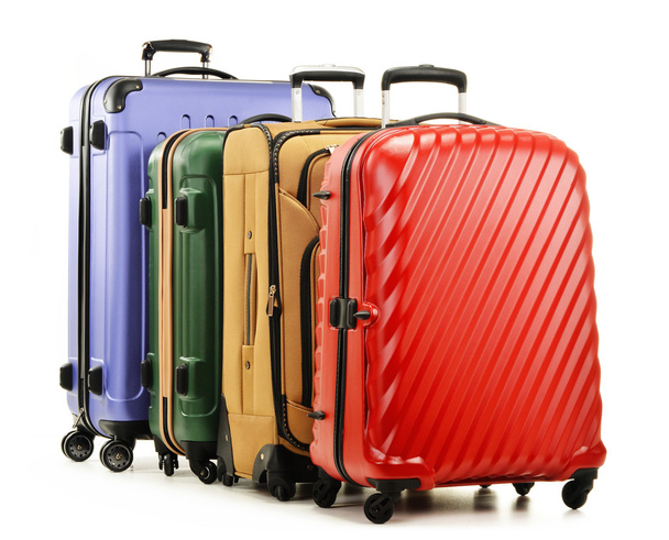 négy bőröndök elszigetelt fehér background - Fotó, kép