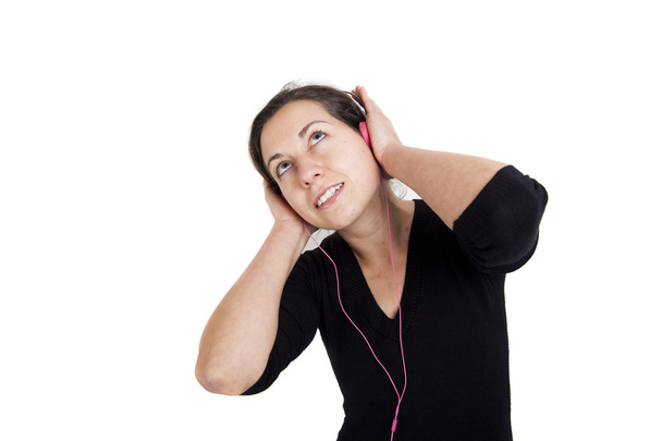 Girl listening a music in headphones, isolated - Foto, Imagem