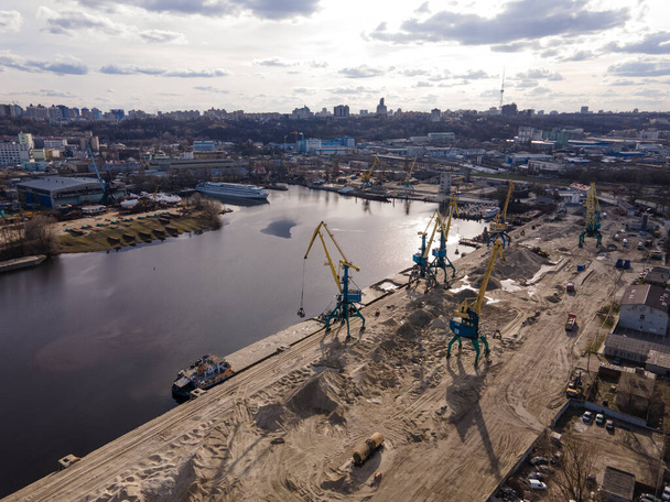 Aerial view of river cargo crane for loading sand onto a barge - Photo, Image