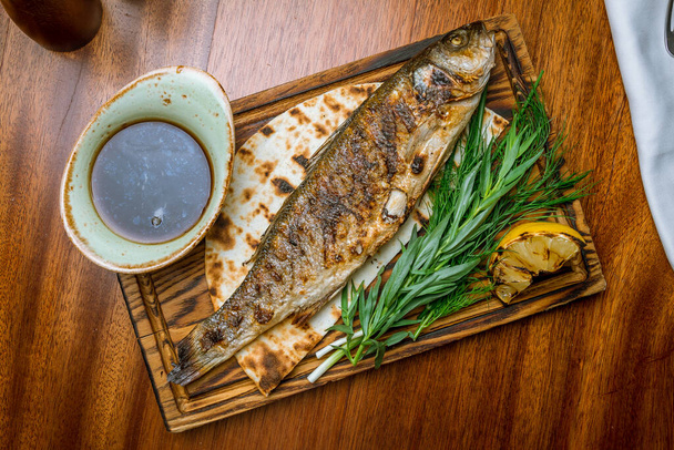 close-up view of fried sea bass fish - 写真・画像