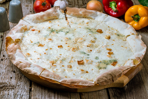 closeup view of delicious quattro formaggi pizza - Photo, Image