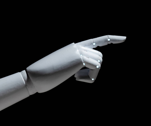 Robot blanco dedo de la mano aislado sobre fondo negro - Foto, Imagen