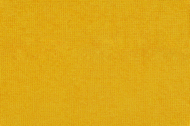 Желтая ткань из микроволокон. Концепция бытовых услуг для домашних хозяйств - Фото, изображение