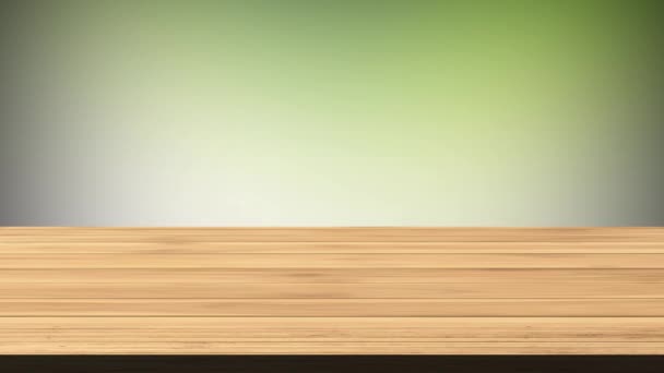 Κενό ξύλινο τραπέζι μπροστά από ανοιχτό πράσινο και γκρι φόντο. Φαινόμενο φωτός και διαρροής. HD πλάνα - Πλάνα, βίντεο