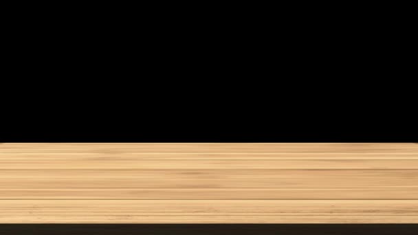 Tavolo in legno vuoto davanti allo sfondo nero e arancione. Effetto luce e perdite. Video HD - Filmati, video