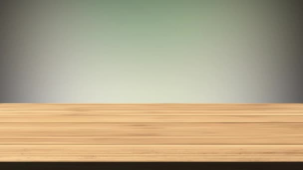 Prázdný dřevěný stůl před světle zeleným a černošedým pozadím. Lehký a netěsný efekt. HD záznam - Záběry, video