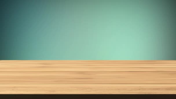 Empty wooden board table in front of light green and blue background. Light and leak effect. HD footage - Footage, Video