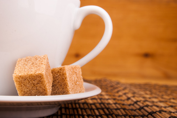 coffe on table with brown sugar - Фото, изображение