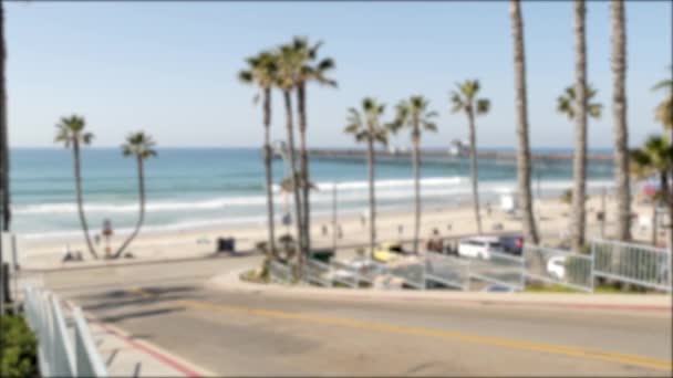 Road to ocean beach California USA. Summertime palm trees. Summer coast near Los Angeles. Sea waves. - Footage, Video