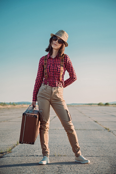 Hipster woman with suitcase - Foto, immagini